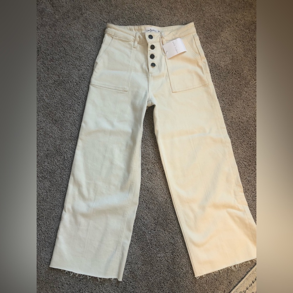 White, wide/straight leg jeans. Never worn with tags!